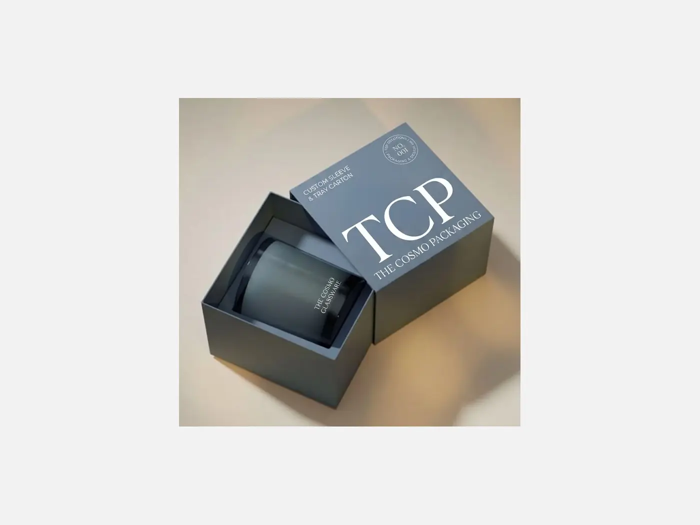 Sleeve and tray packaging with a sliding reveal structure